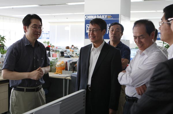 Ministry-level officials visit China Daily
