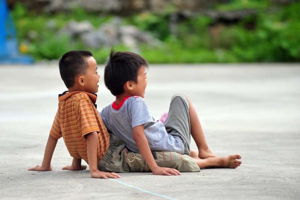 Left behind, children turn to nature