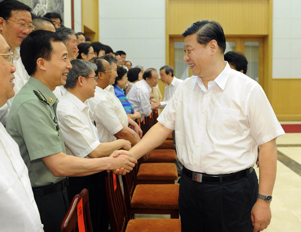 Chinese VP greets experts, grassroots talents