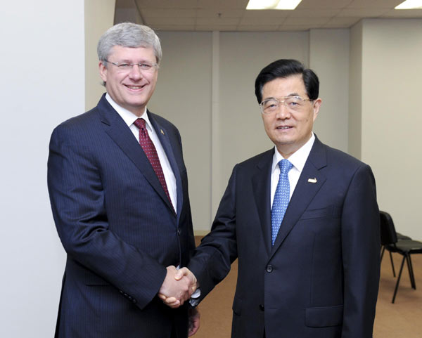 China, Canada sign investment promotion accord