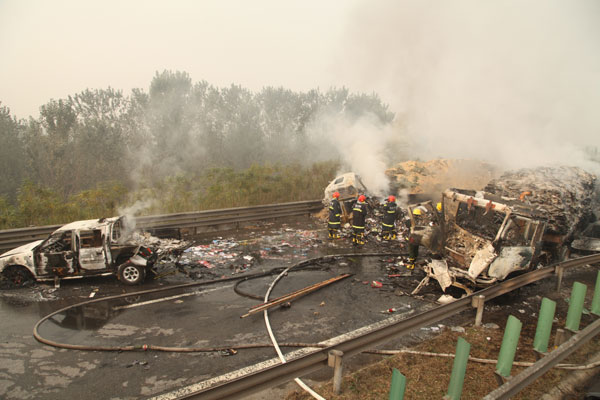 At least 2 dead after 30-car pileup in N China