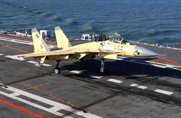 Jets land on China's 1st aircraft carrier