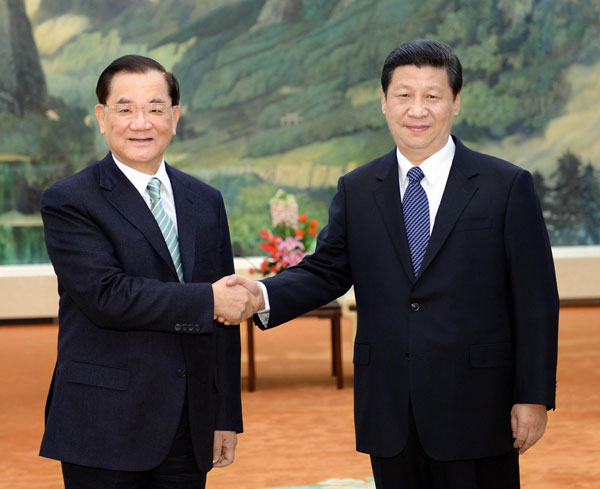 Xi stresses peaceful reunification of China