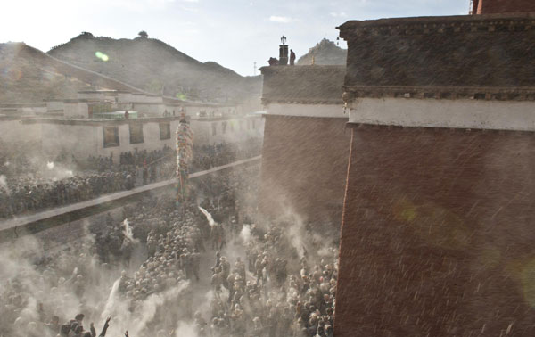 Tibetans welcome new year with flour fight