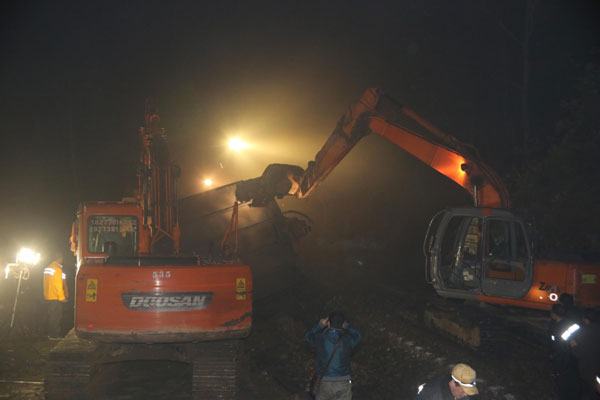 C China mudslide derails freight train