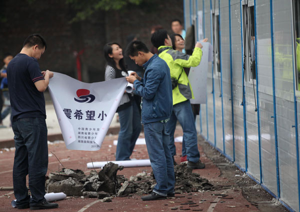 More students resume classes in quake-hit region