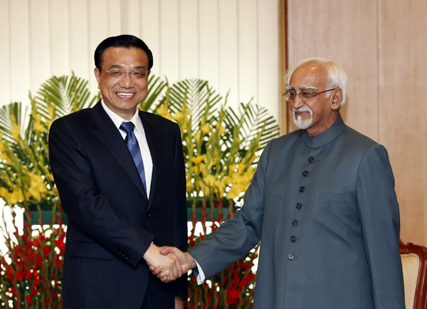 Li calls for more political exchanges with India