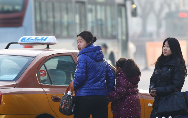 Beijing to hold taxi price hike hearing