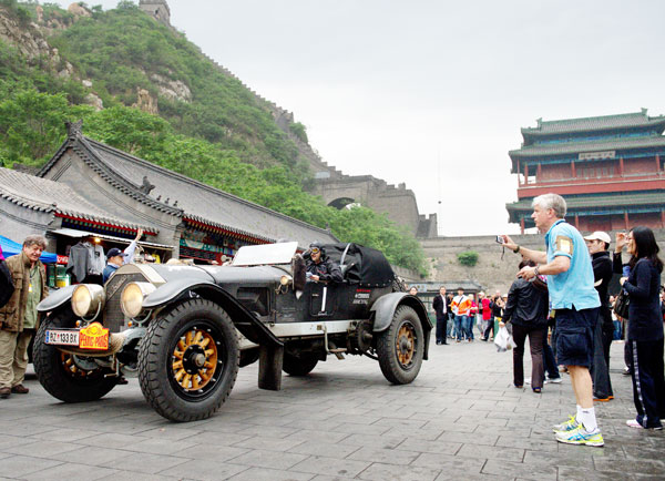 Drivers start their engines for Beijing-Paris classic car race