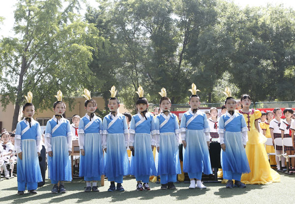 Pupils celebrate Children’s Day with calligraphy performance