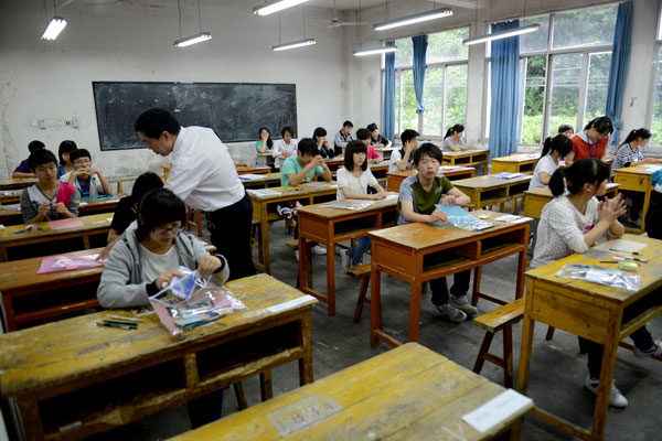 Students in Liu'an city, East China's Anhui province, are ready to take their exam, June 7, 2013. Big exam day kicks off