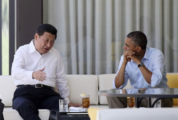 Obama and Xi start talk with a walk