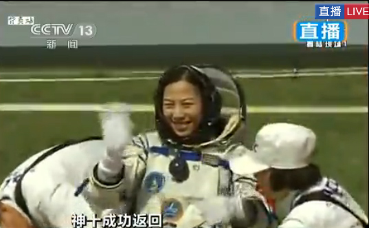Astronauts go out of Shenzhou X's return capsule