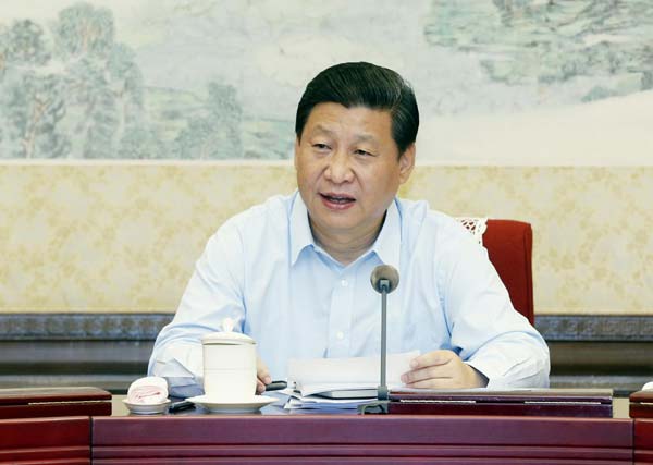 Xi stresses adherence to socialism, serving people