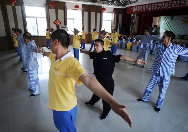 Youngsters recovering from drug addiction exercise at a rehab center in Shanxi, June 13, 2013. Battling addiction with compulsory detox