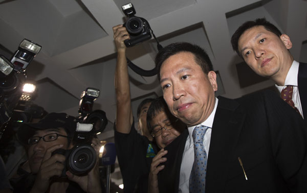 Lover of late HK tycoon gets 12 years for forging will