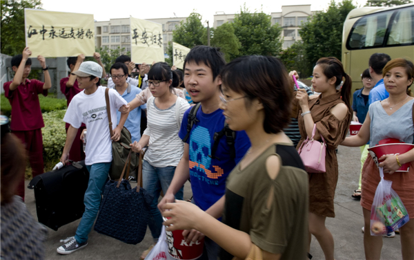 Asiana crash students return home