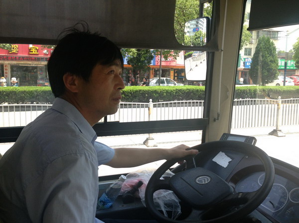 Feeling the heat: Shanghai bus driver