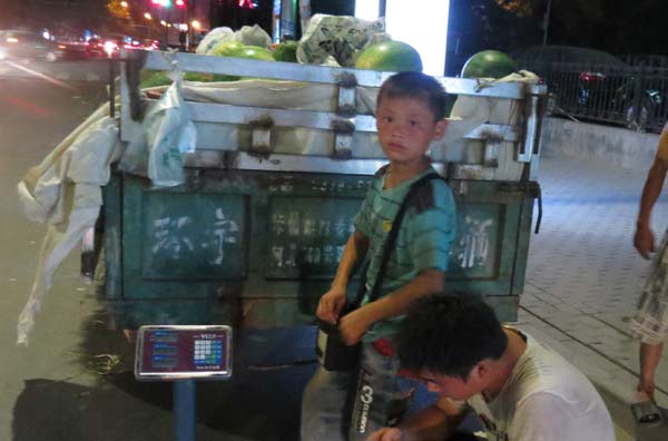 Selling watermelons: a boy's first taste of city life