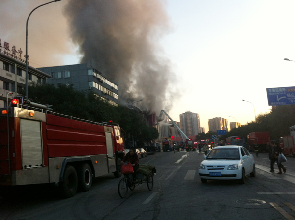 Shopping mall fire in downtown Beijing