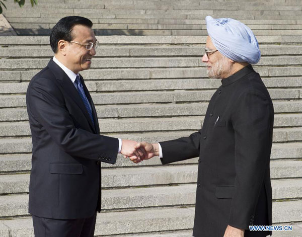 Li hails Singh's visit as 'landmark' event