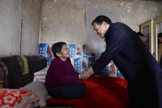 Li pledges to rebuild more shantytowns this year