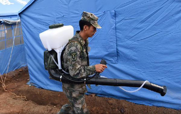 Soldiers prevent disease in disaster zone