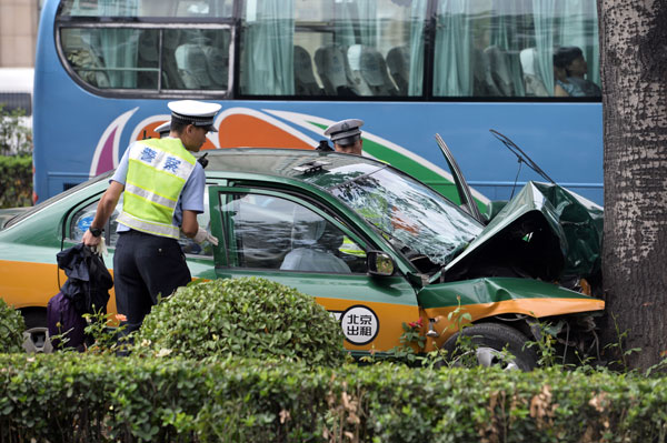 Three die in Beijing taxi crash