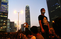 HK officials resume work as protests thin