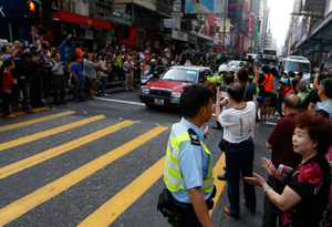 Protesters condemned for charging police cordon in HK