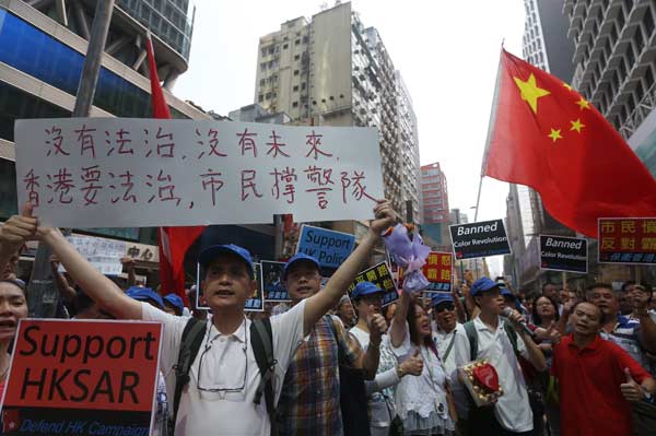 Protesters ignore HK court order
