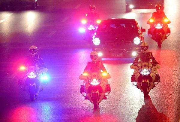 China resumes motorcycle escorts for foreign leaders