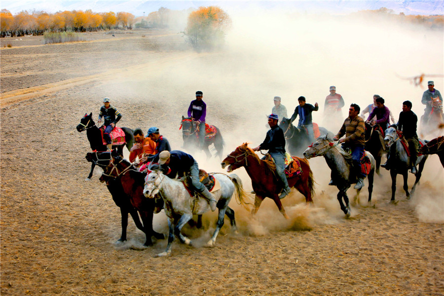 Herdsmen of Tajik ethnic group play traditional game