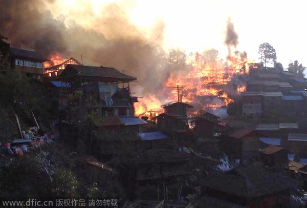 Fire engulfs ethnic village in SW China