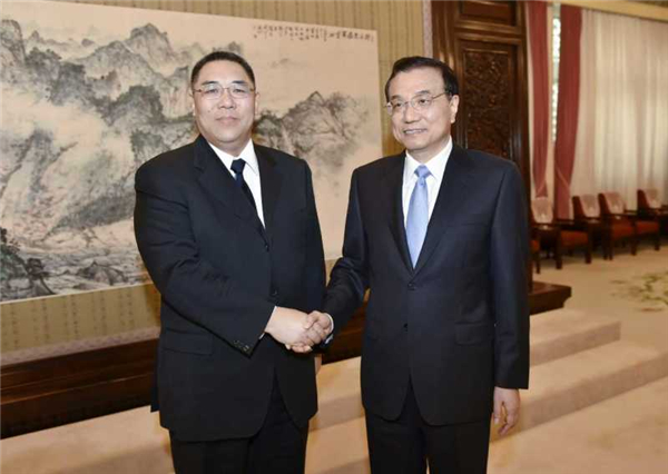 Li meets Macao chief executive
