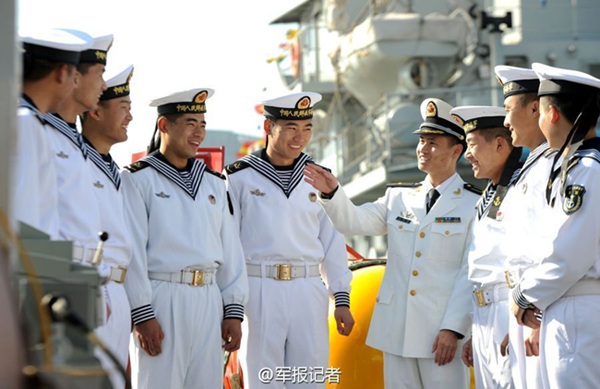 Chinese navy soldiers put on new uniform