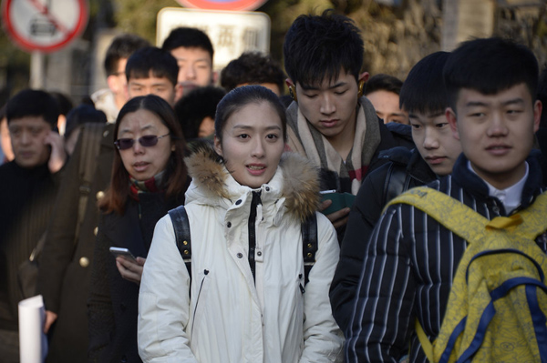 Smiles, worries, spears at college entrance exam