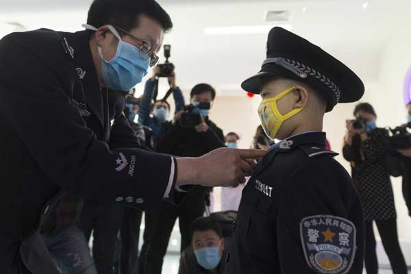 Leukemia boy's policeman dream comes true