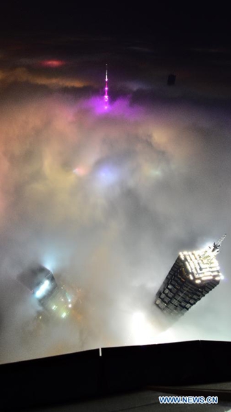 Magnificent scene: buildings amid heavy fog in Shanghai