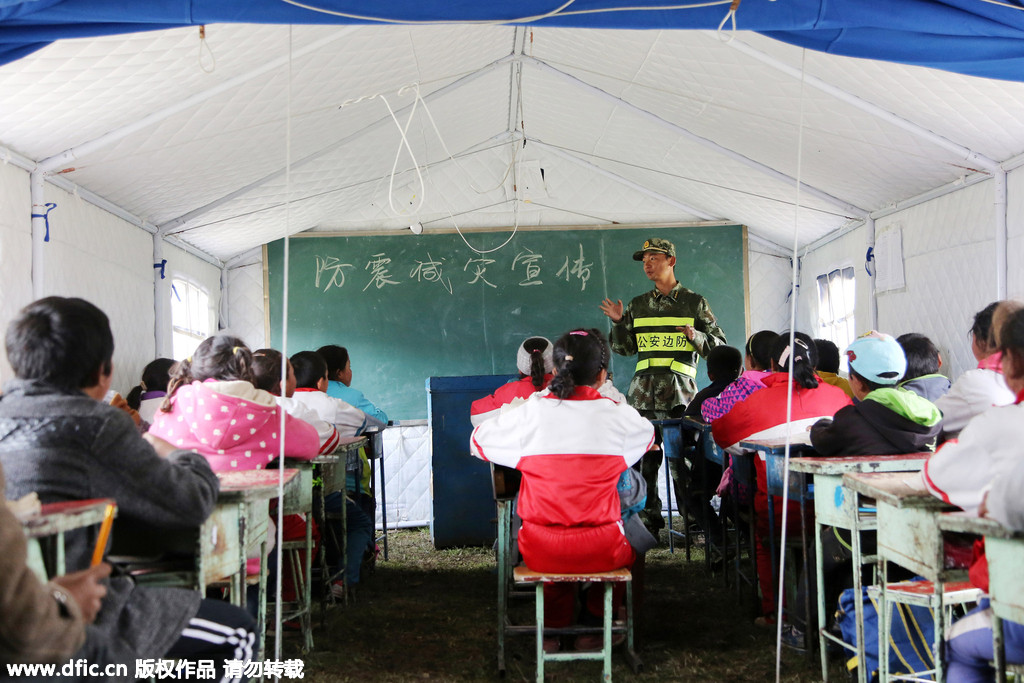 Earthquake relief soldiers have a lighter moment with kids