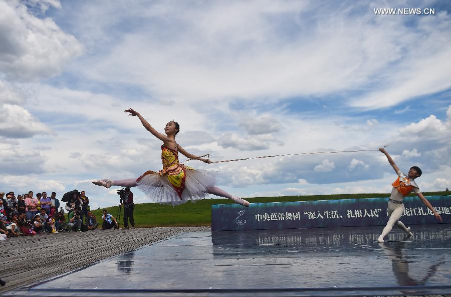 Ballet dancers perform at Zhalong National Nature Reserve in China's Qiqihar