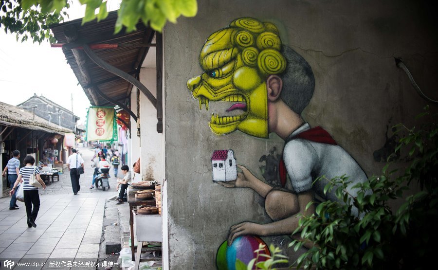 French street artist finds inspiration in Shanghai village