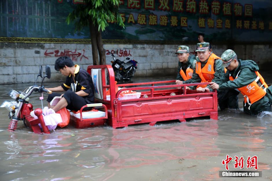 People evacuated after downpour in SW China