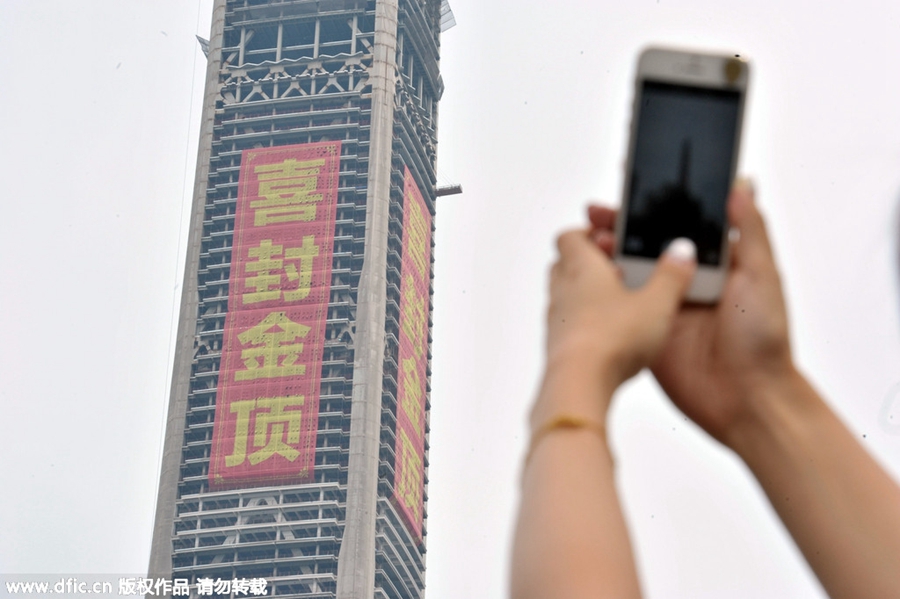 World's second tallest building capped in Tianjin