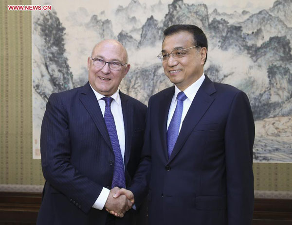 Chinese premier meets with French finance minister