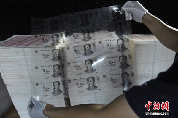 Guangdong busts major counterfeit banknote factories
