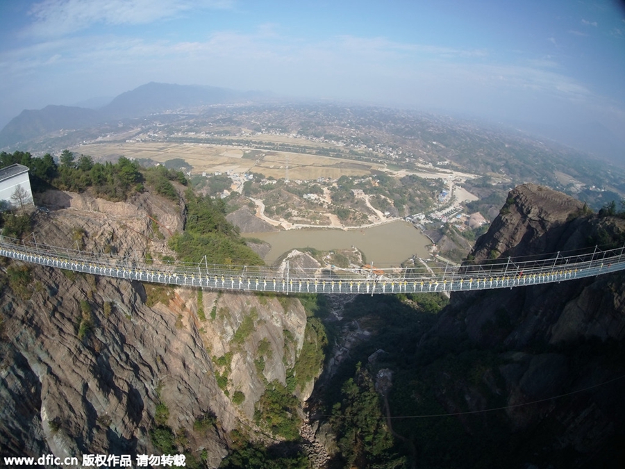 Yoga in the air on suspended bridge