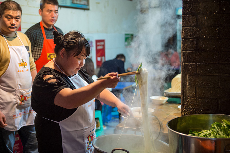 Restaurateur spreads Chongqing xiaomian all around the world