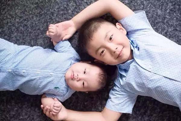 China mulls law amendment to allow 'one couple, two children'