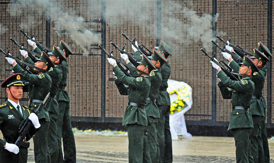 China holds burial ceremony for soldier remains returned from ROK